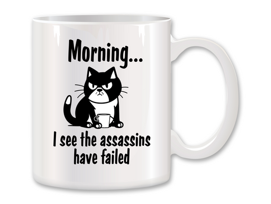 I See the Assassins Have Failed Cat Coffee Mug